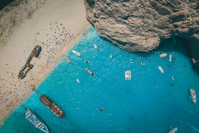 Aerial drone view of iconic beach of Navagio or Shipwreck deep turquoise clear sea, Zakynthos island