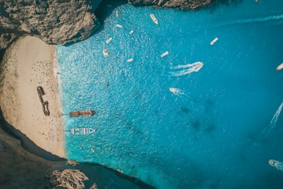 Aerial drone view of iconic beach of Navagio or Shipwreck deep turquoise clear sea, Zakynthos island