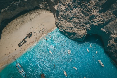 Aerial drone view of iconic beach of Navagio or Shipwreck deep turquoise clear sea, Zakynthos island